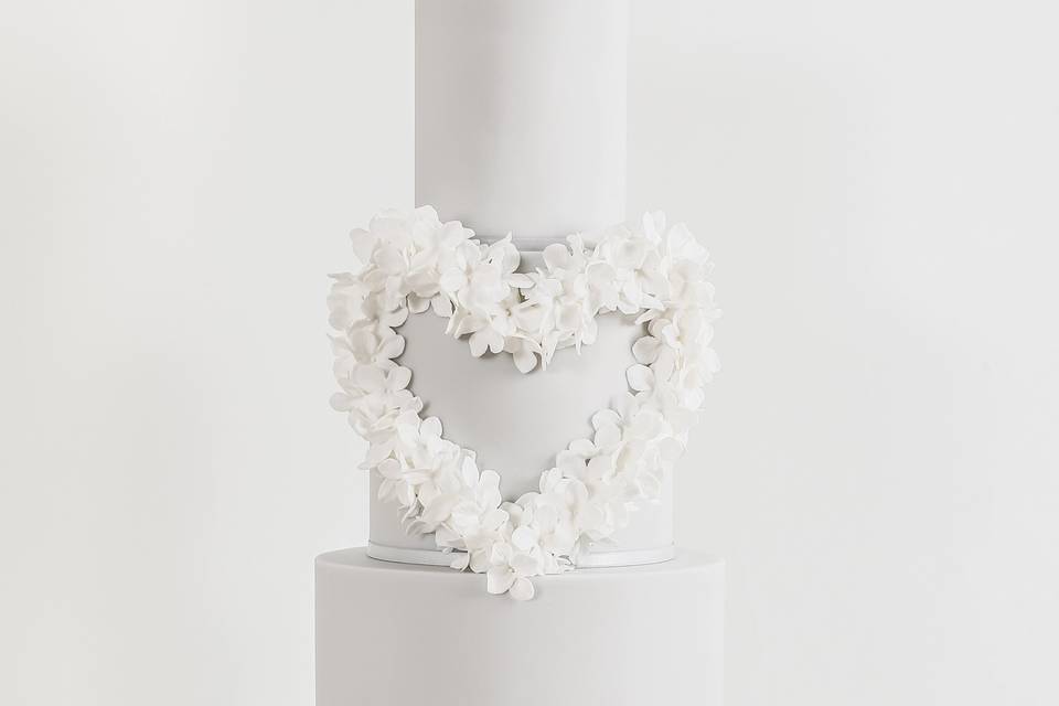 Grey hydrangea heart wedding cake