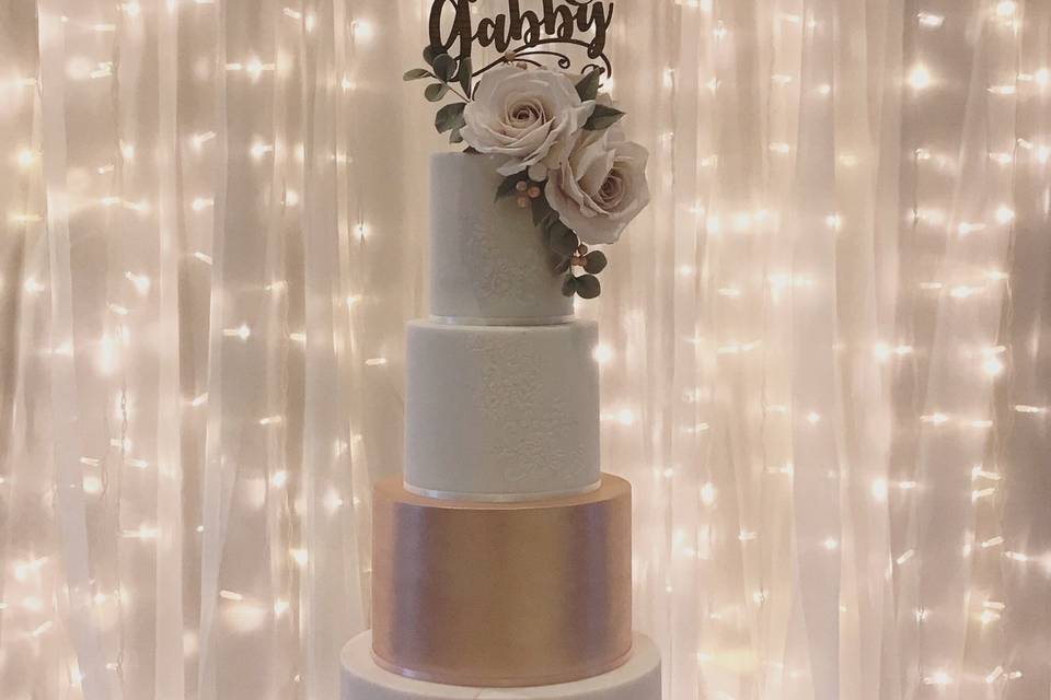 Blush and rose gold wedding cake