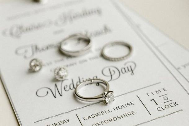 Minimalist Eyelet Bound Invite