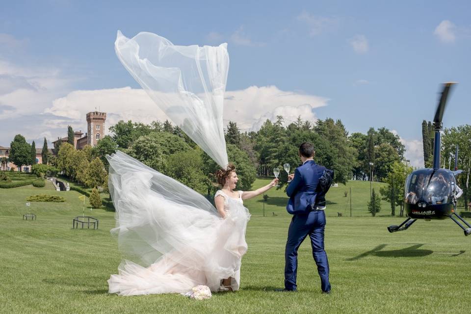 Bride and groom by helicopter