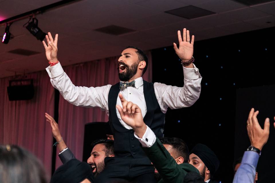 Groom being carried