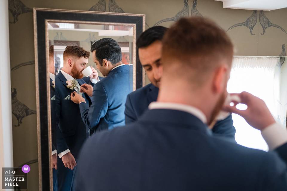 Groomsman enjoying a tea