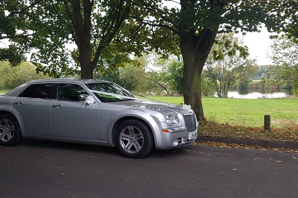 Silver Chrysler / Baby Bentley