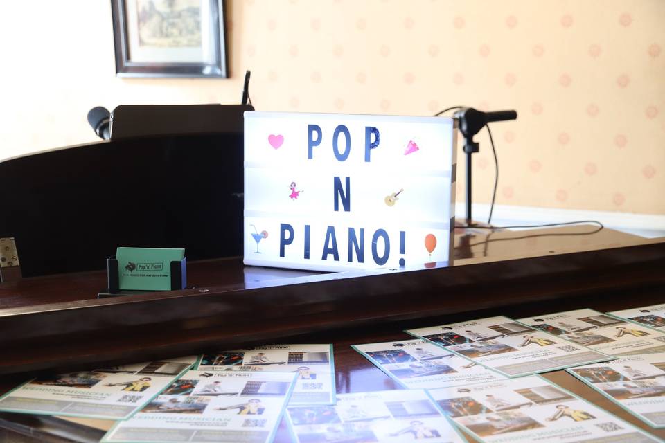 Pop n Piano sign