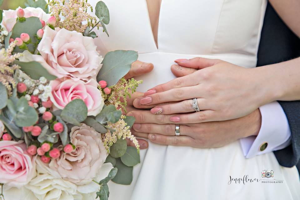 Wedding rings on their hands