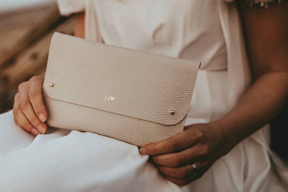 Cream leather clutch bags