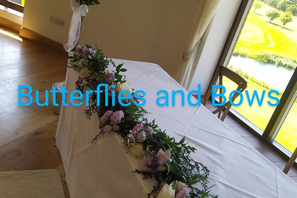 Top table garland and baytrees