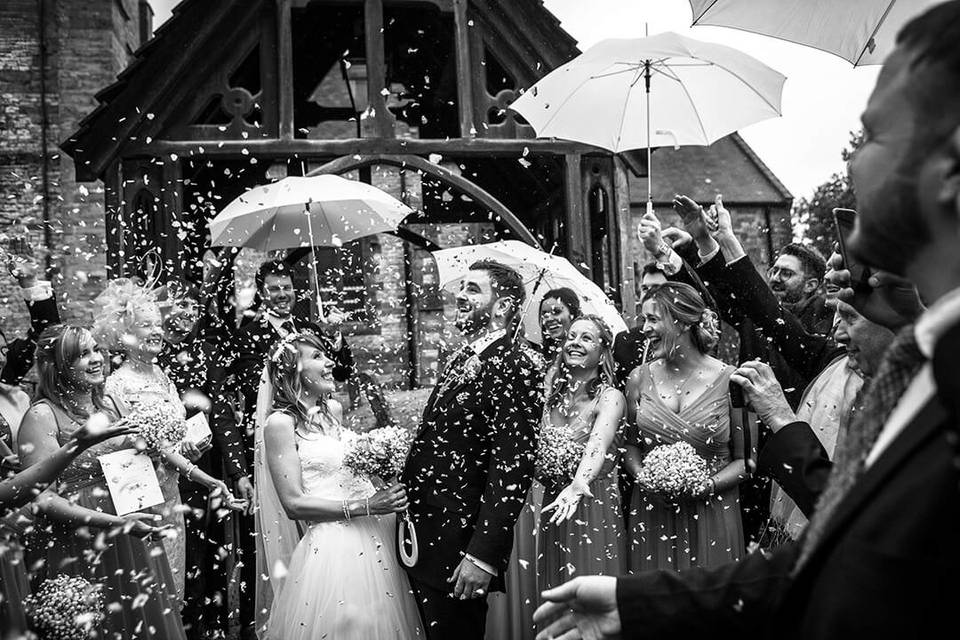 Confetti raining on couple