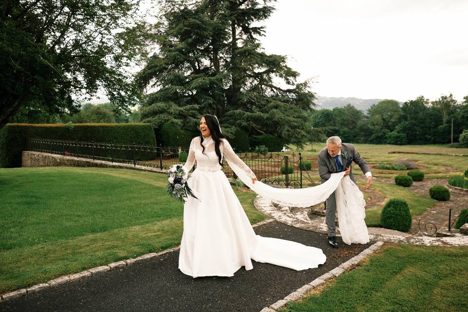 Dad helps with veil