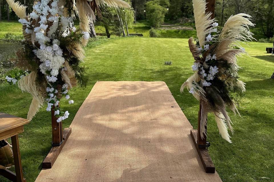 Outdoor wooden ceremony arch