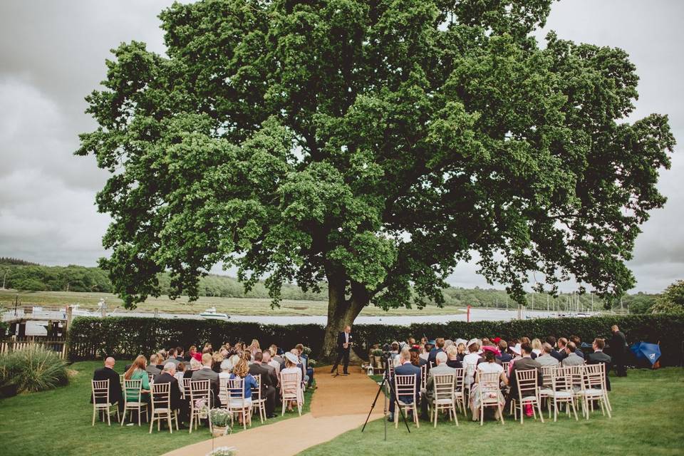 Outdoor ceremony under tree