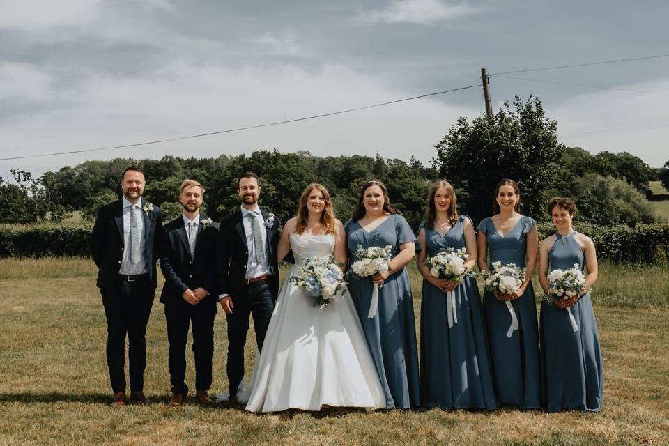 White and blue bridal party