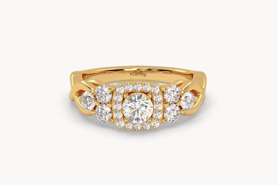 Halo cluster engagement ring in yellow gold