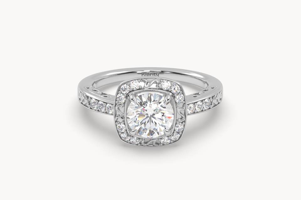 Cushion halo engagement ring with diamond band