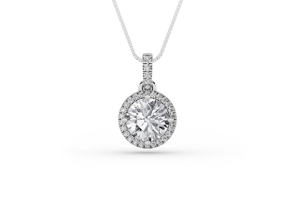 Round halo diamond pendant in white gold