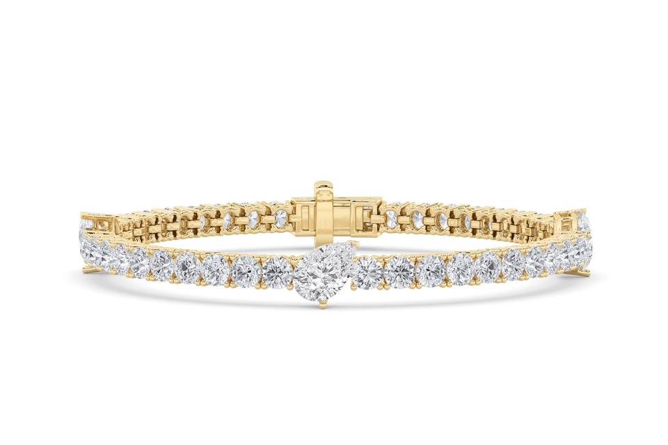 East-west diamond station bracelet in yellow gold