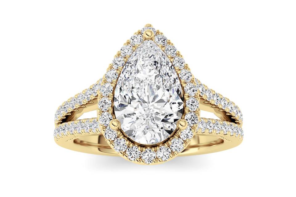Pear halo split shank engagement ring in yellow gold