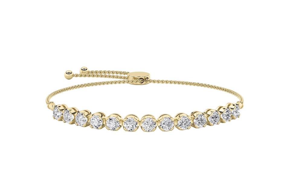 Round diamond bolo bracelet in yellow gold