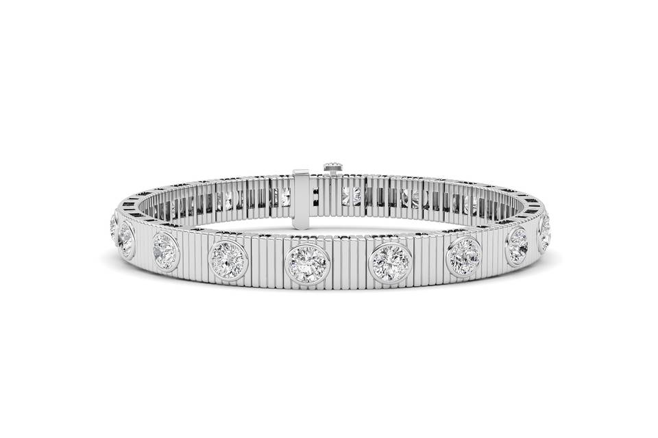 Round bezel diamond bangle in white gold