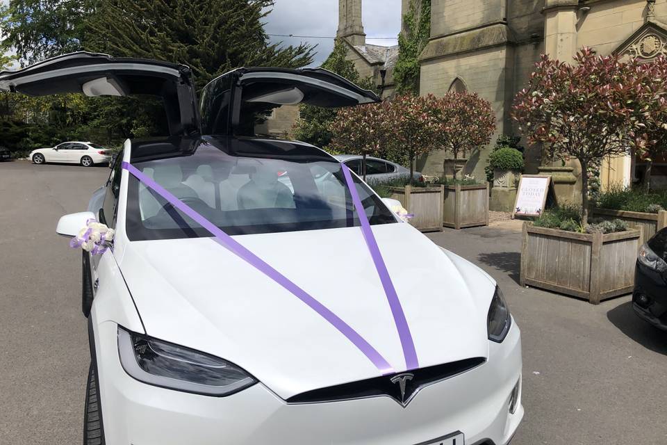 Tesla Model X with ribbon