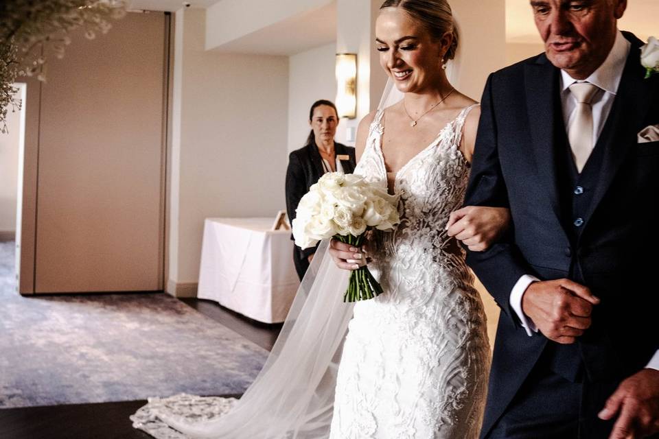 Father and bride down isle