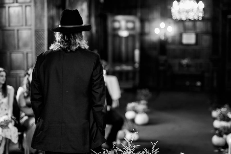 Groom waiting in ceremony