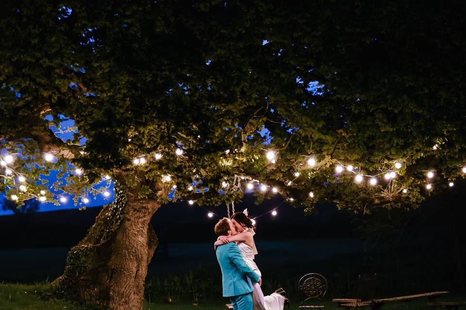 Couple under tree