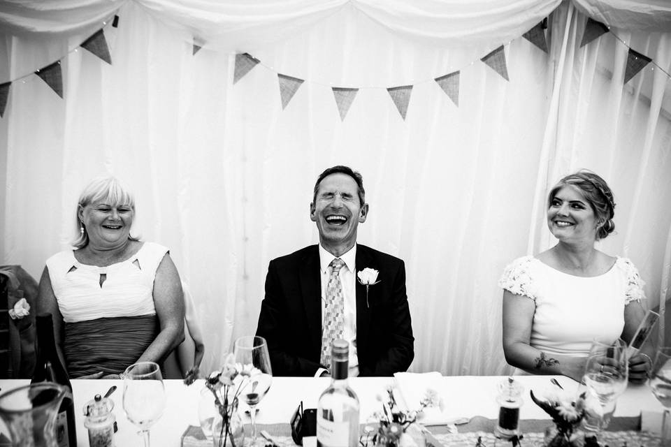 Dad laughing at speeches