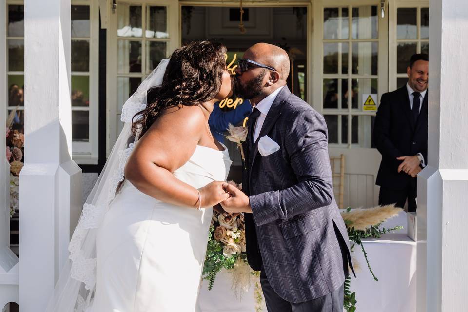 Bride and groom kissing