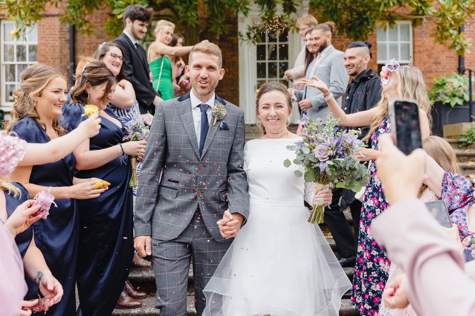 Bride and groom confetti shot