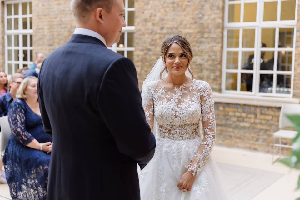 Bride and groom exchanging vow