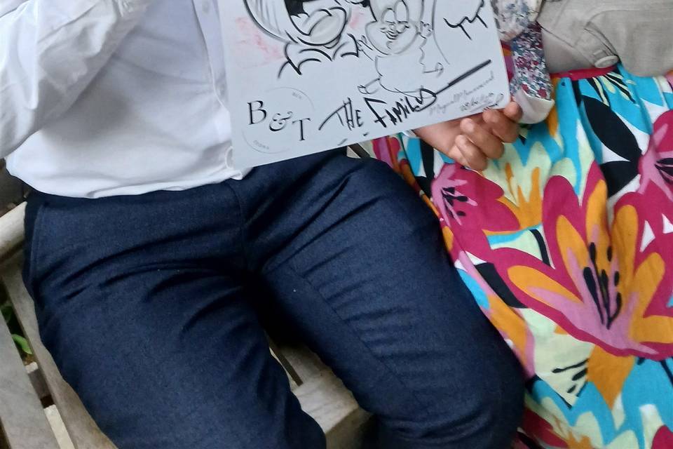 Guests with their caricature
