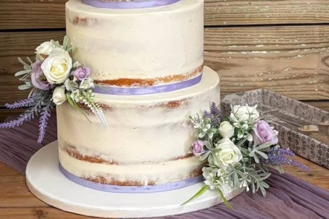 Semi naked purple wedding cake