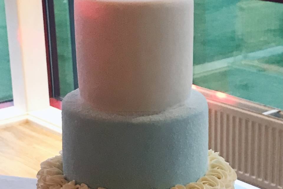 Blue and white rosette cake