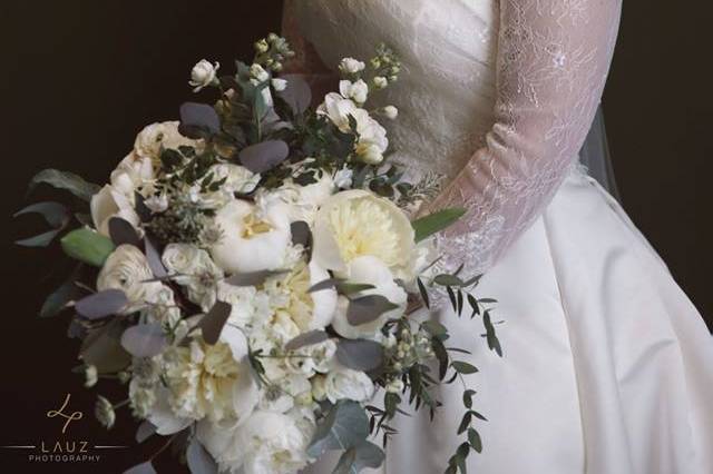 Smiling with her bouquet