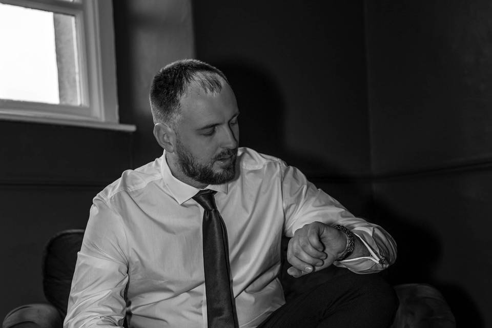 Groom watching the time
