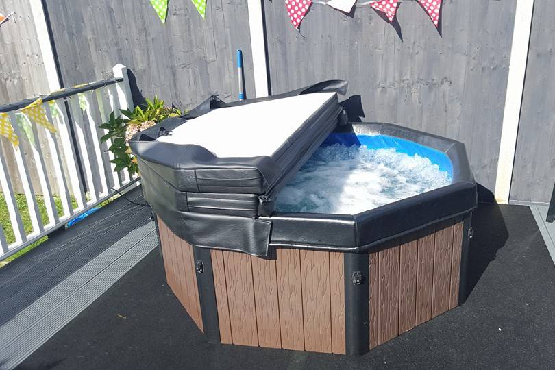 Covered hot tub