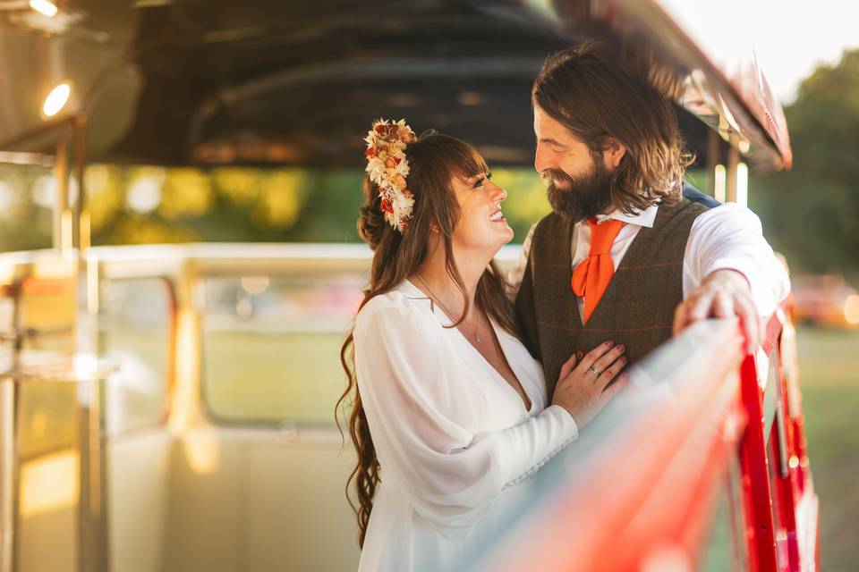 Couple pose on bus