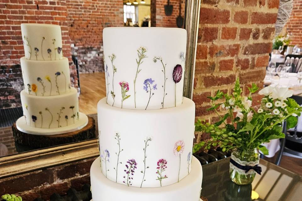 3 tier cake with dried flowers
