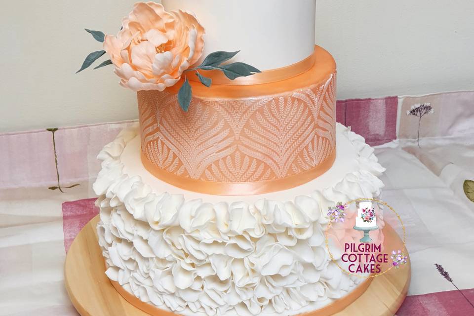 4 tiered cakes with ruffles