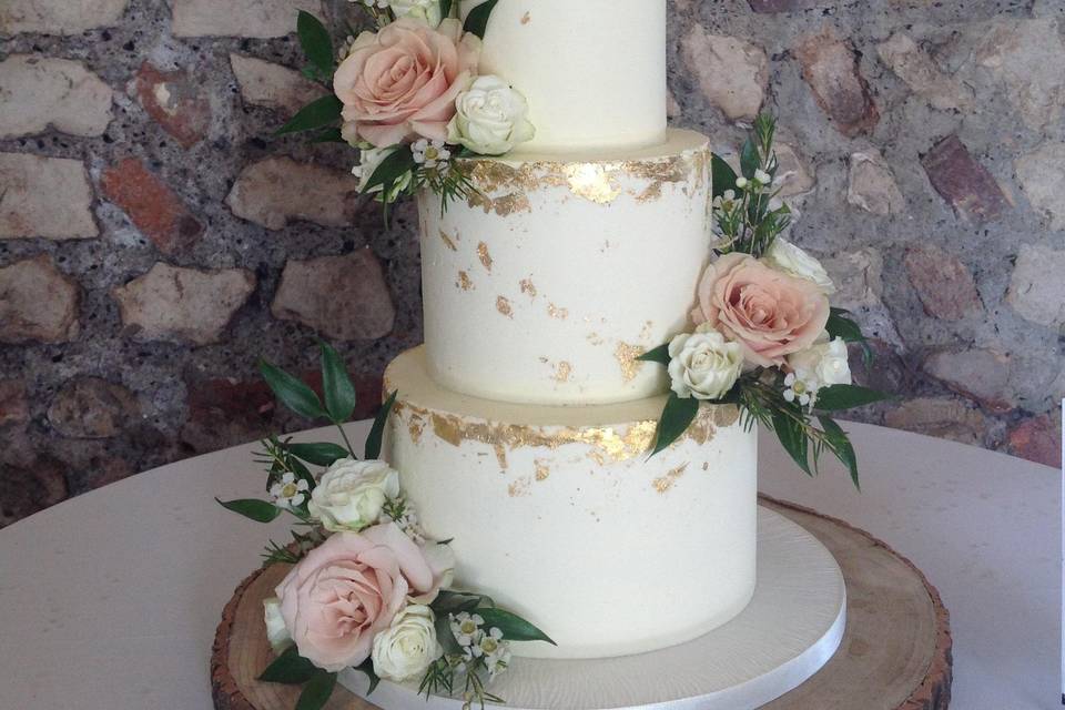 3 tier buttercream and gold leaf