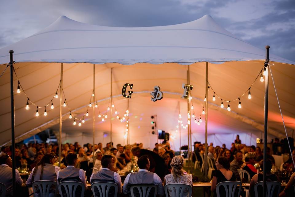 2 tents with festoon lights