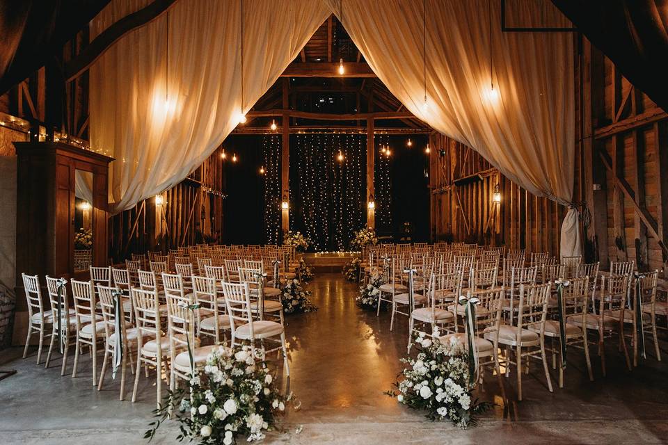 Ceremony inside barn