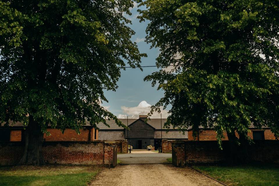 Childerley Long Barn and trees