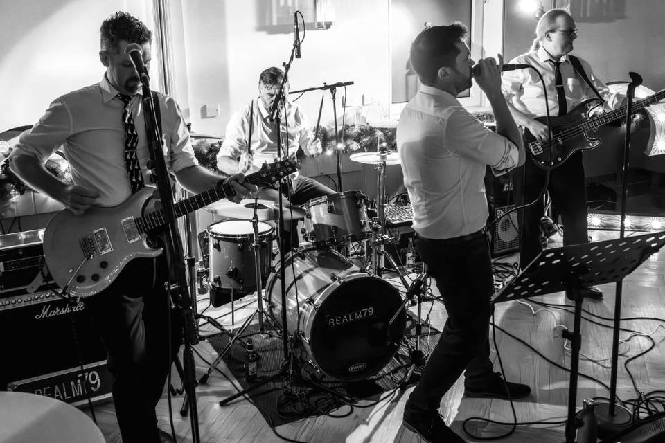 Realm79 performing at a weddin