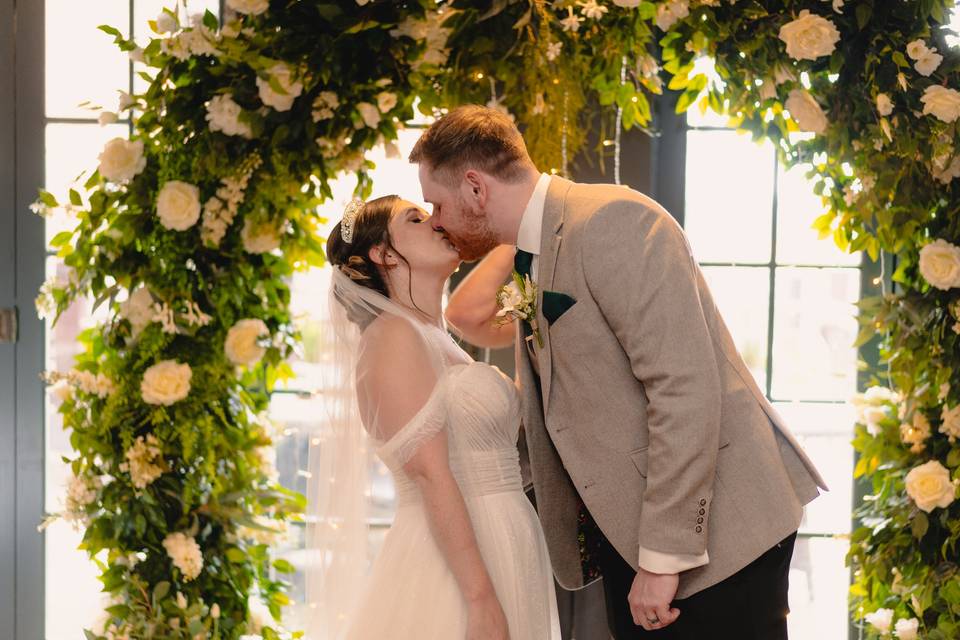 Bride and Groom First Kiss