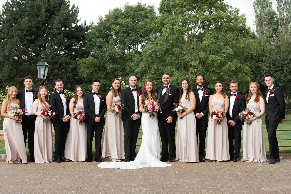 Bridesmaid with groomsmen