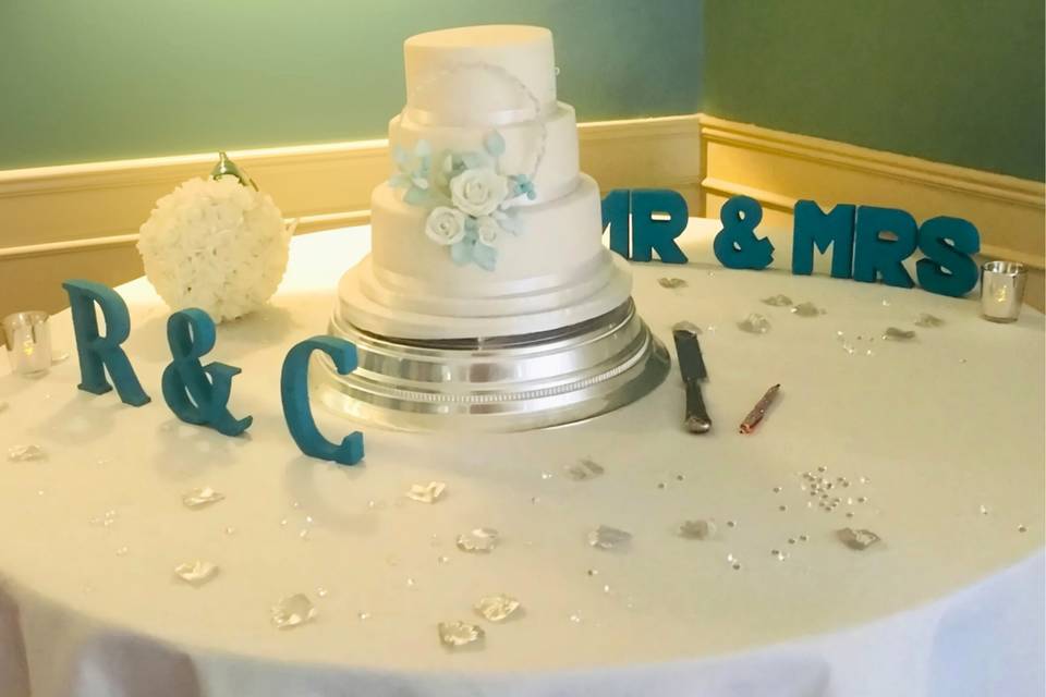 White & Teal Wedding Cake