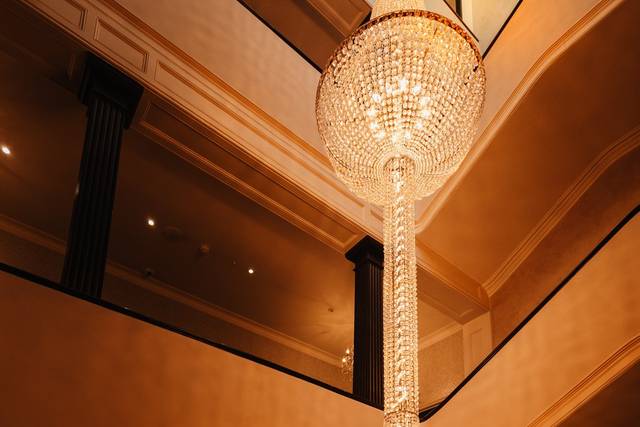 Couple by Chandeliers