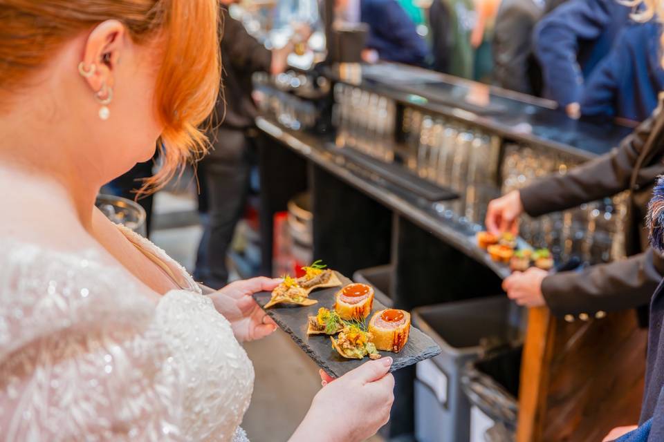 Guests holding small plates